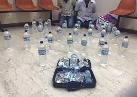 Indian held with 67 bottles of local liquor