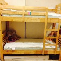 Bunk bed with 2 IKEA mattresses and a Chico playhouse for sale