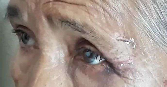 Son stabs mother and throws her out of the house